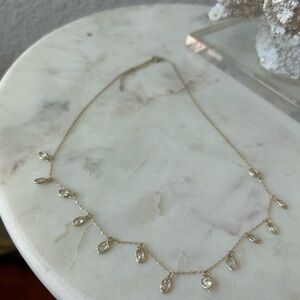 Elegant Gold Necklace with Teardrop Accents